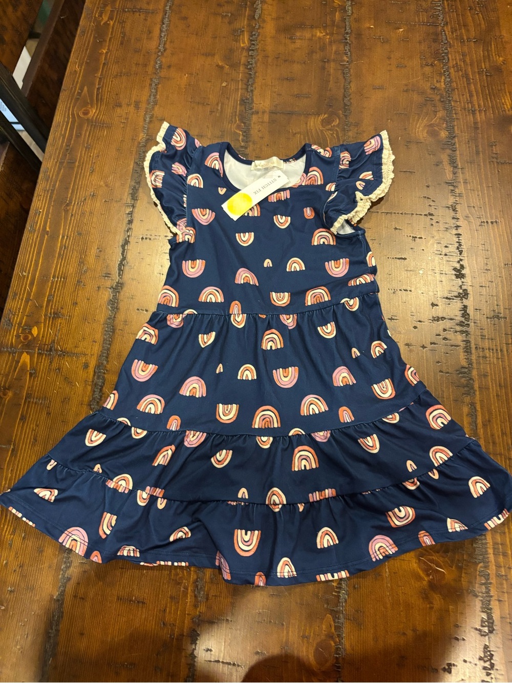 NWT. Sunset west. Girls' Navy Rainbow Print Ruffle Dress. Size 5t